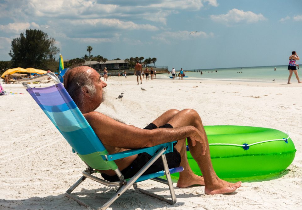 man on beach. snowbird preparedness nokomis fl